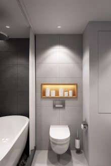 Warna hitam, kelabu dan putih di bahagian dalam bilik mandi