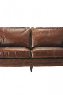 다리가 달린 가죽 소파