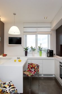 Black and white kitchen with bright accents