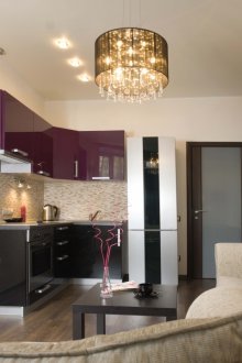Purple-black corner set in the kitchen-living room