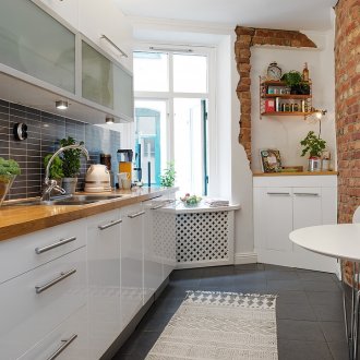 Kitchen design with brick wall.