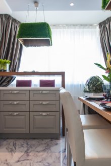 Beautiful kitchen with dining table and breakfast bar