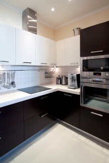 Black and white corner glossy kitchen