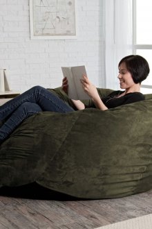 Тъмно зелен безрамков стол