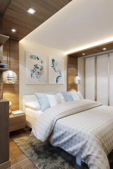 Blue accents in a brown and white bedroom