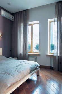 Purple wall in the bedroom