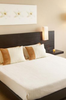 Beige and black bedroom