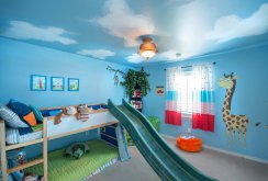 Blue ceiling with white clouds in a children's room