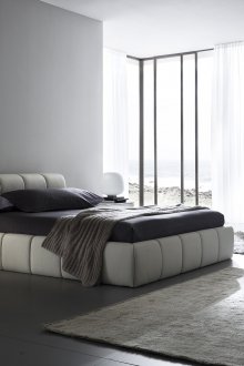 Beige, white and gray colors in the design of a large bedroom