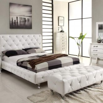 White furniture and trendy decor in the bedroom