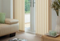 Beige vertical blinds in the interior