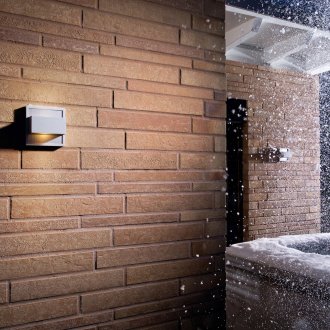 Кафяви клинкерни плочки в декорацията на фасадата на къщата