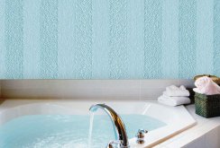 Blue striped wallpaper in the interior of the bathroom