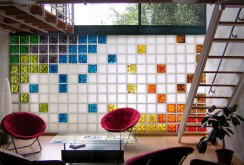 Wall of colored glass blocks in the living room