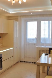 Таван на две нива с осветление от гипсокартон в кухнята