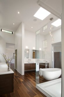 Modern chandelier in a bright bathroom