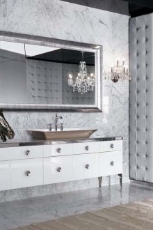 Art Deco chandelier and sconce in the bathroom