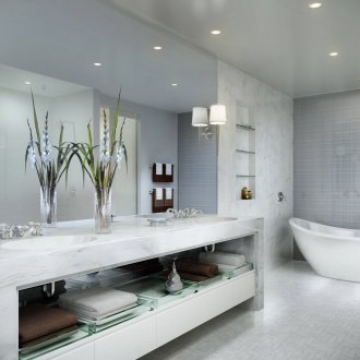 Spotlights and sconces in the art deco style in the bathroom