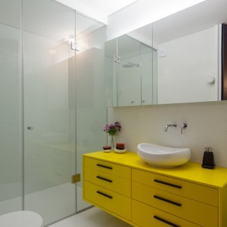 Yellow pedestal in the bathroom