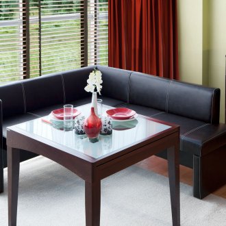 Black upholstered furniture in the kitchen