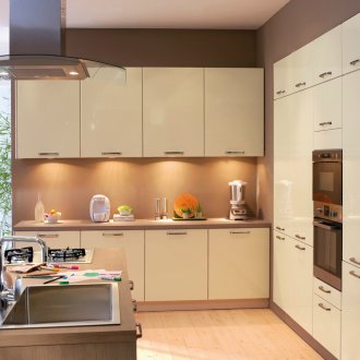 Beige glossy suite in a modern kitchen
