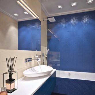 Spotlight in a beige and blue bathtub