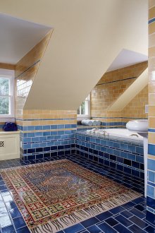 Spacious beige and blue bathroom