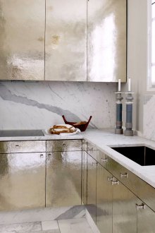 Refrigerator under the window under the kitchen