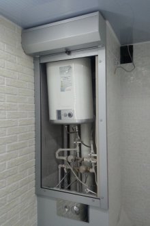 Box for the refrigerator under the window