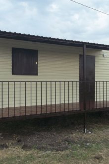 Carport mit profiliertem Dach