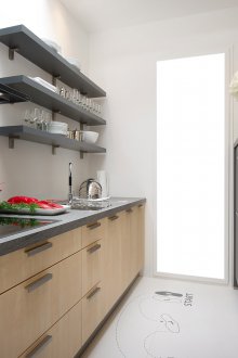 Narrow cabinet in the bathroom
