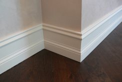 Wide white skirting board