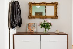 Two-tone chest of drawers with a mirror in the hallway