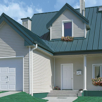 Pediment of a house from corrugated board