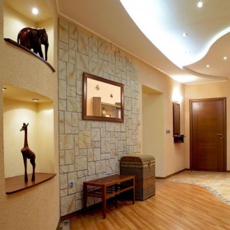 Fur coat plaster in the corridor