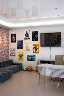 Rest area and work desk in room for teenage boy