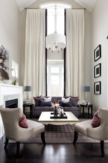 White curtains on a high window