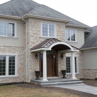 Монтаж на фасадни панели от камък