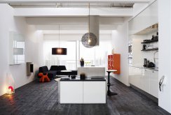 Beautiful dark wood floor with light walls and ceiling.