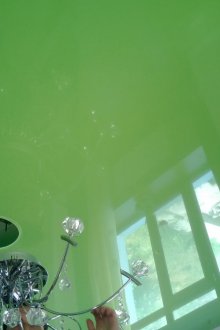 Green ceiling with chandelier