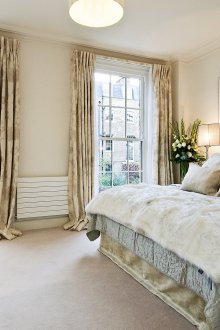 Уютна спалня в пастелни цветове