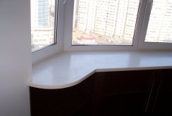 Plastic window sill on the balcony