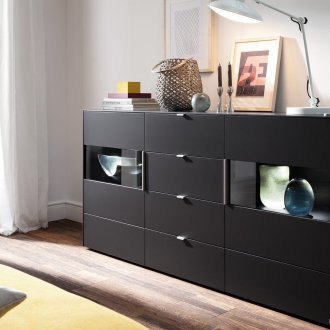 Black dresser in the living room