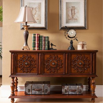 Carved dresser in the living room