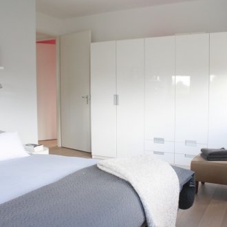 Glossy bedroom in the apartment