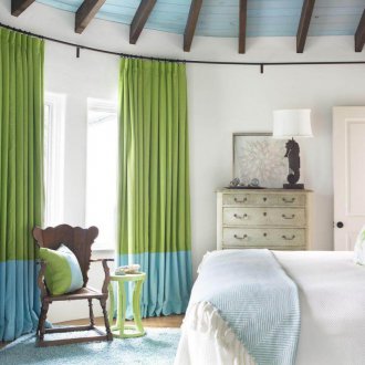 Green curtains in the bedroom