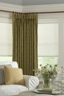 Green curtains with a pattern