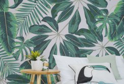 Focus on the wall with green wallpaper