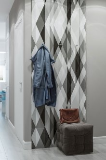 Gray wallpaper in a spacious hallway