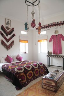 Boho style bedroom with chest